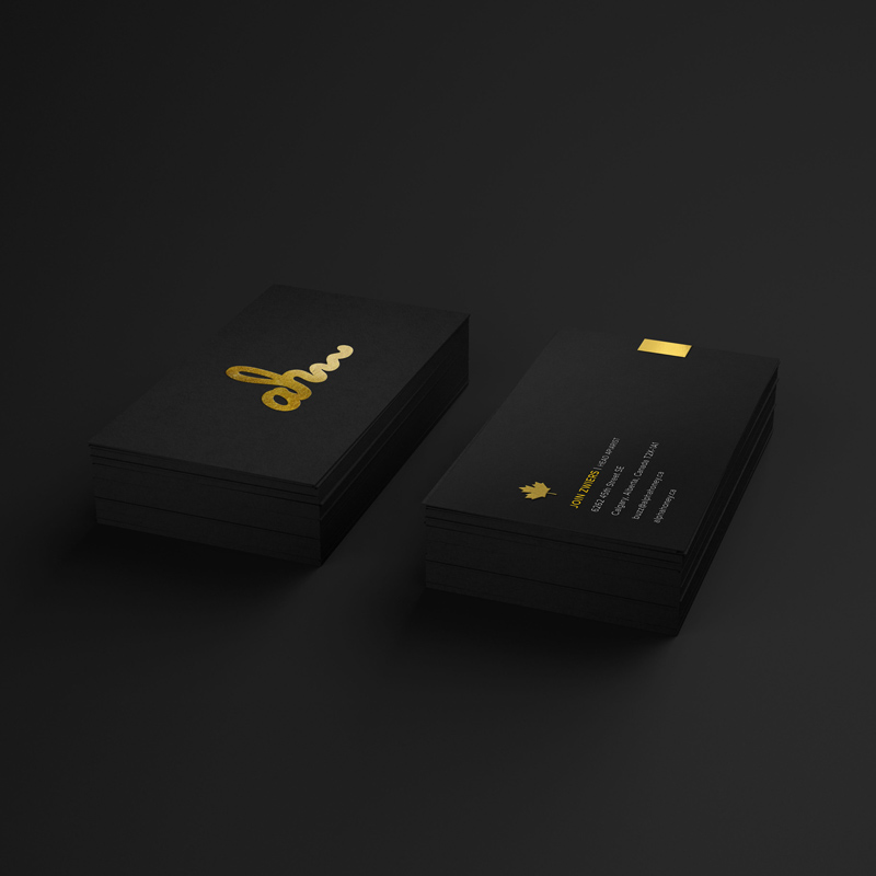 Alpha Honey double-sided cards—logo-forward front, organized contact back—crafted to match the brand’s modern, minimalist system.