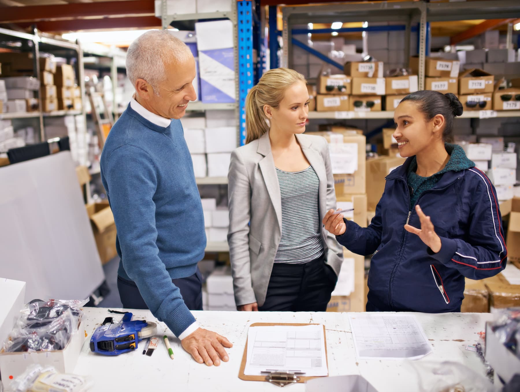 older couple consulting with paint expert