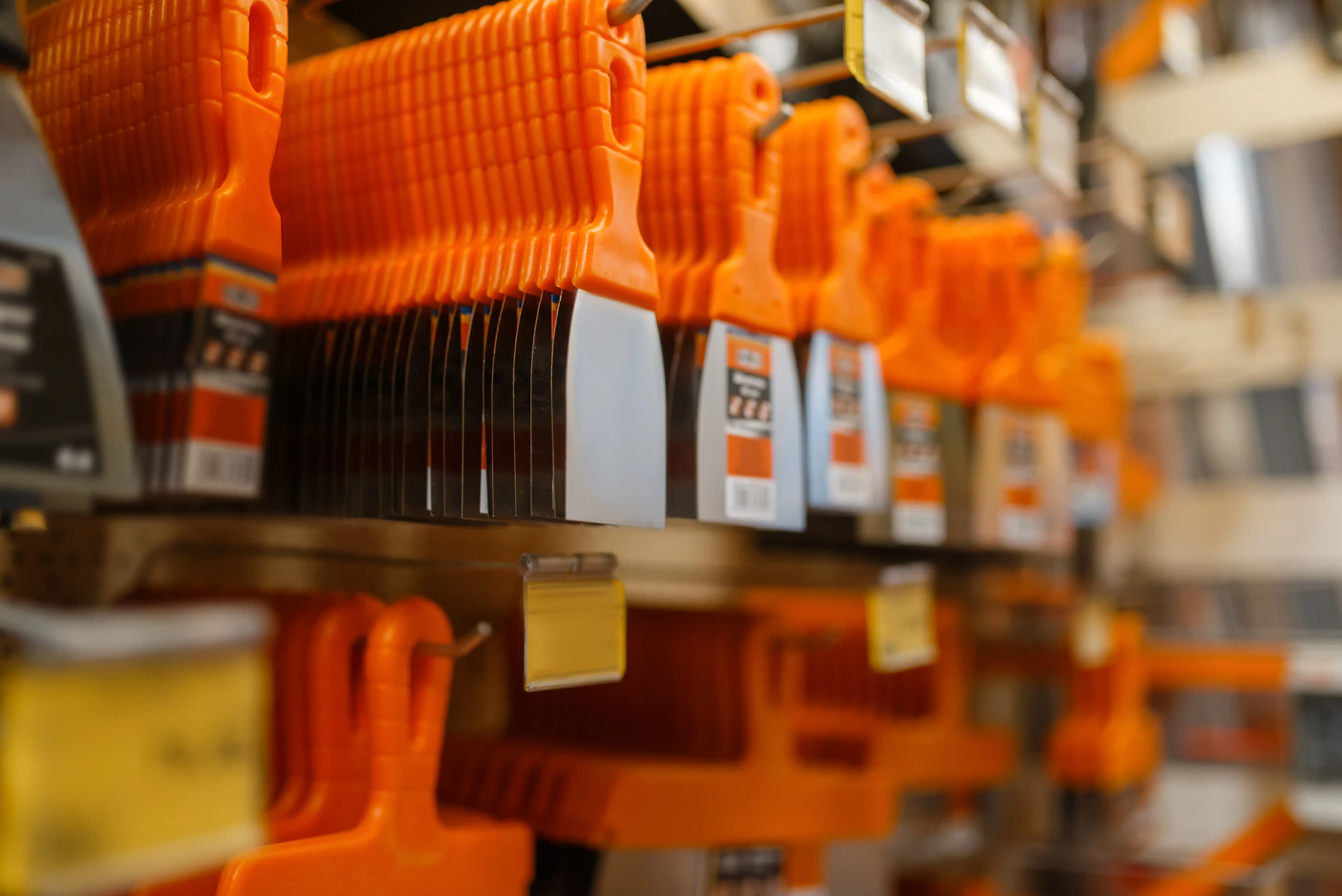 hardware store aisle displaying spackle tool