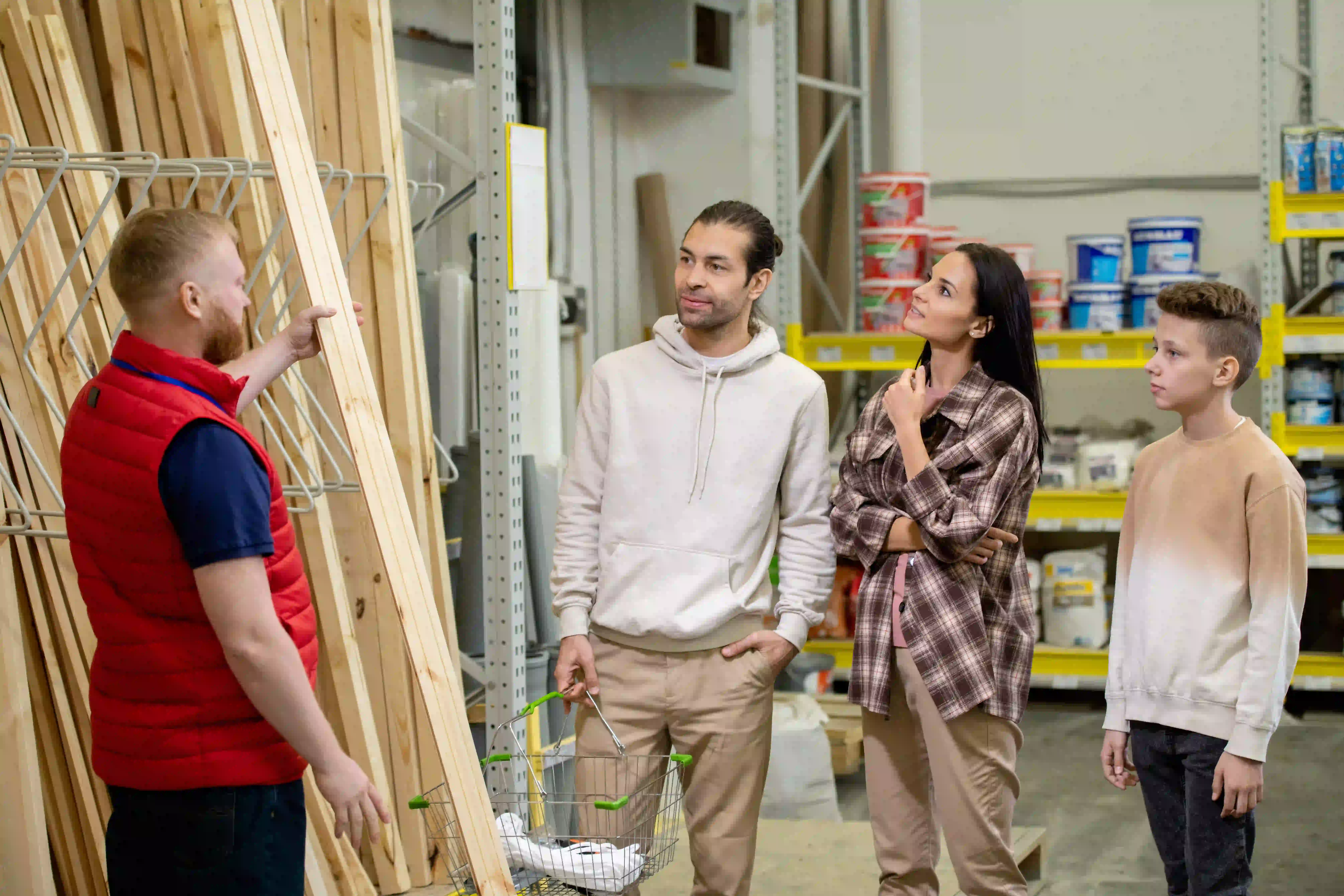 sales manager helping customers choose lumber