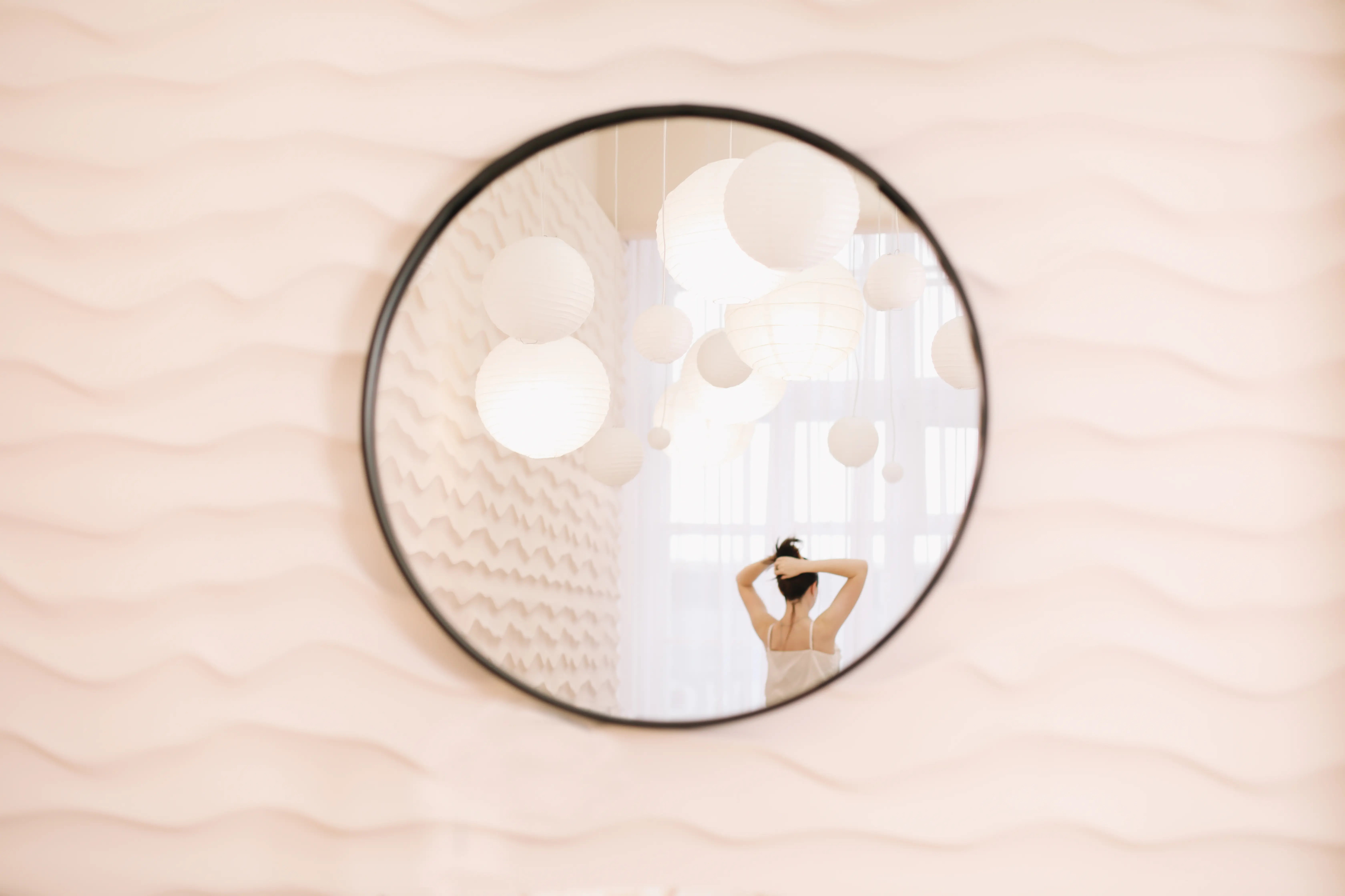 mirror hanging on wall