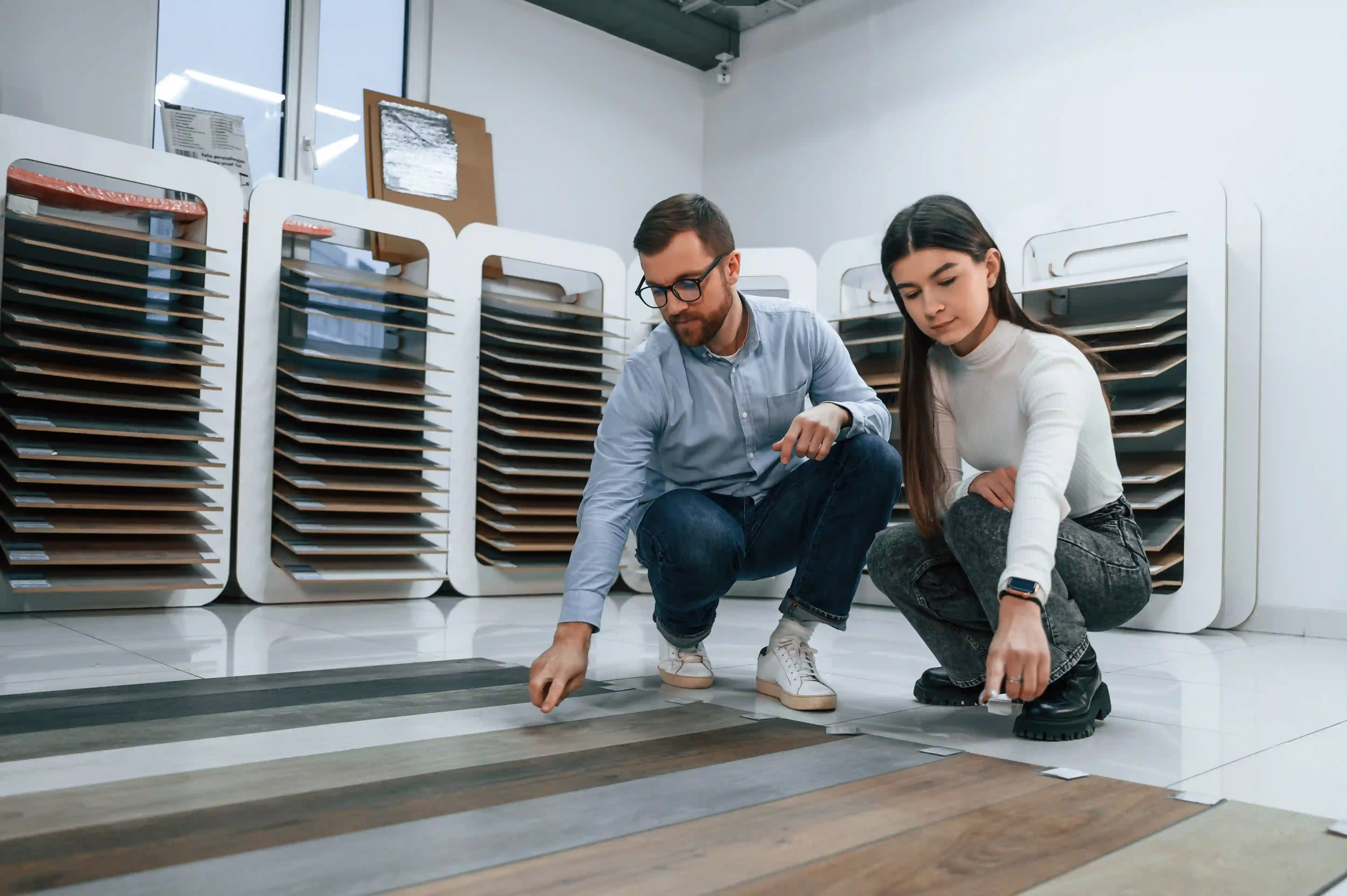 couple picking out linoleum flooring
