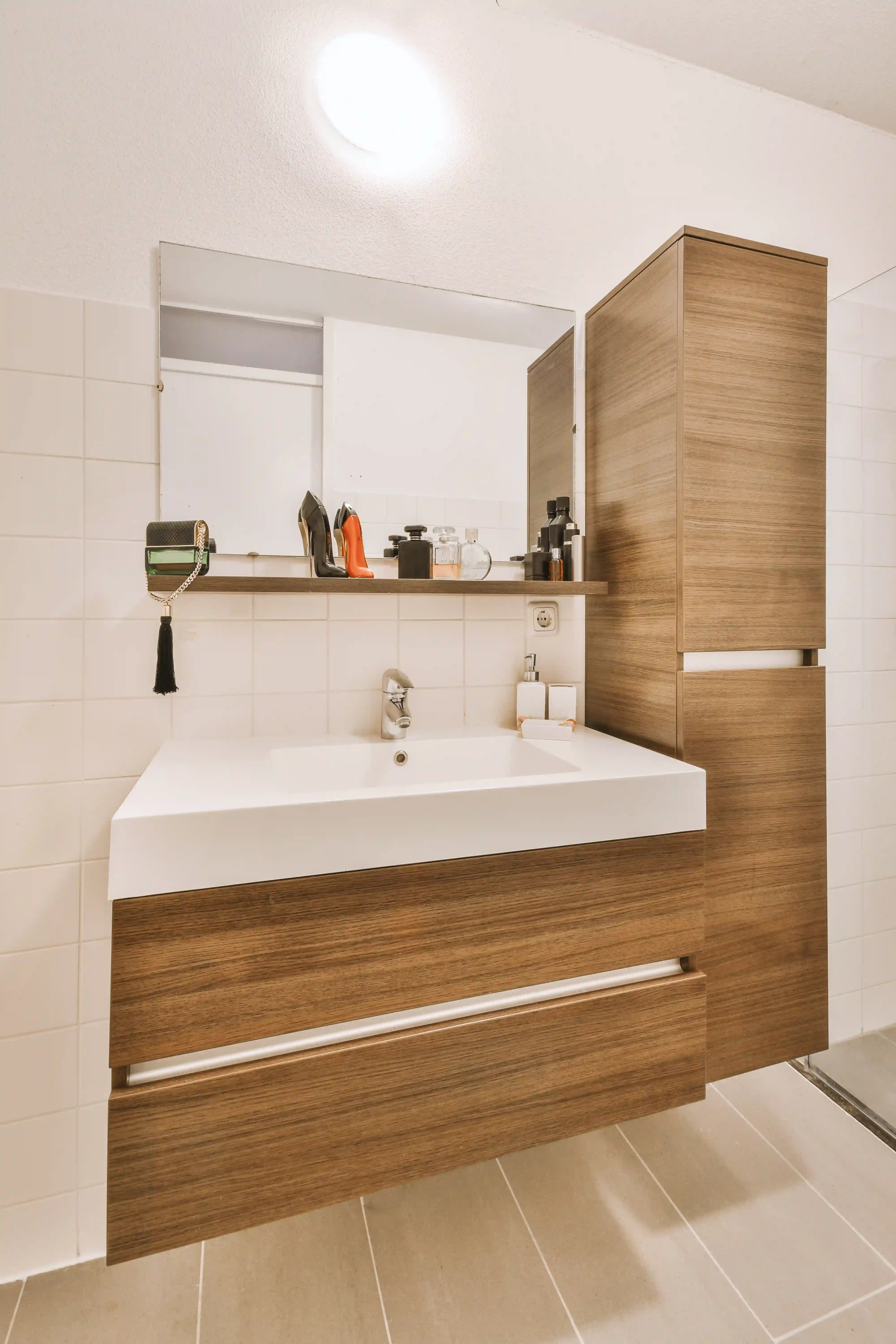 bathroom counter with tall storage