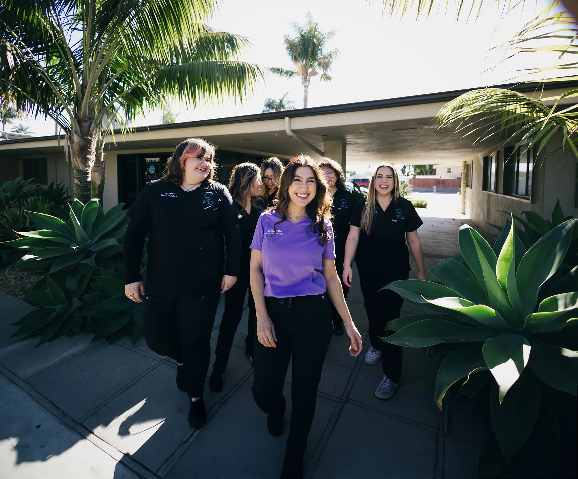 The Serene Dentistry team walking together outside their Ventura, CA office