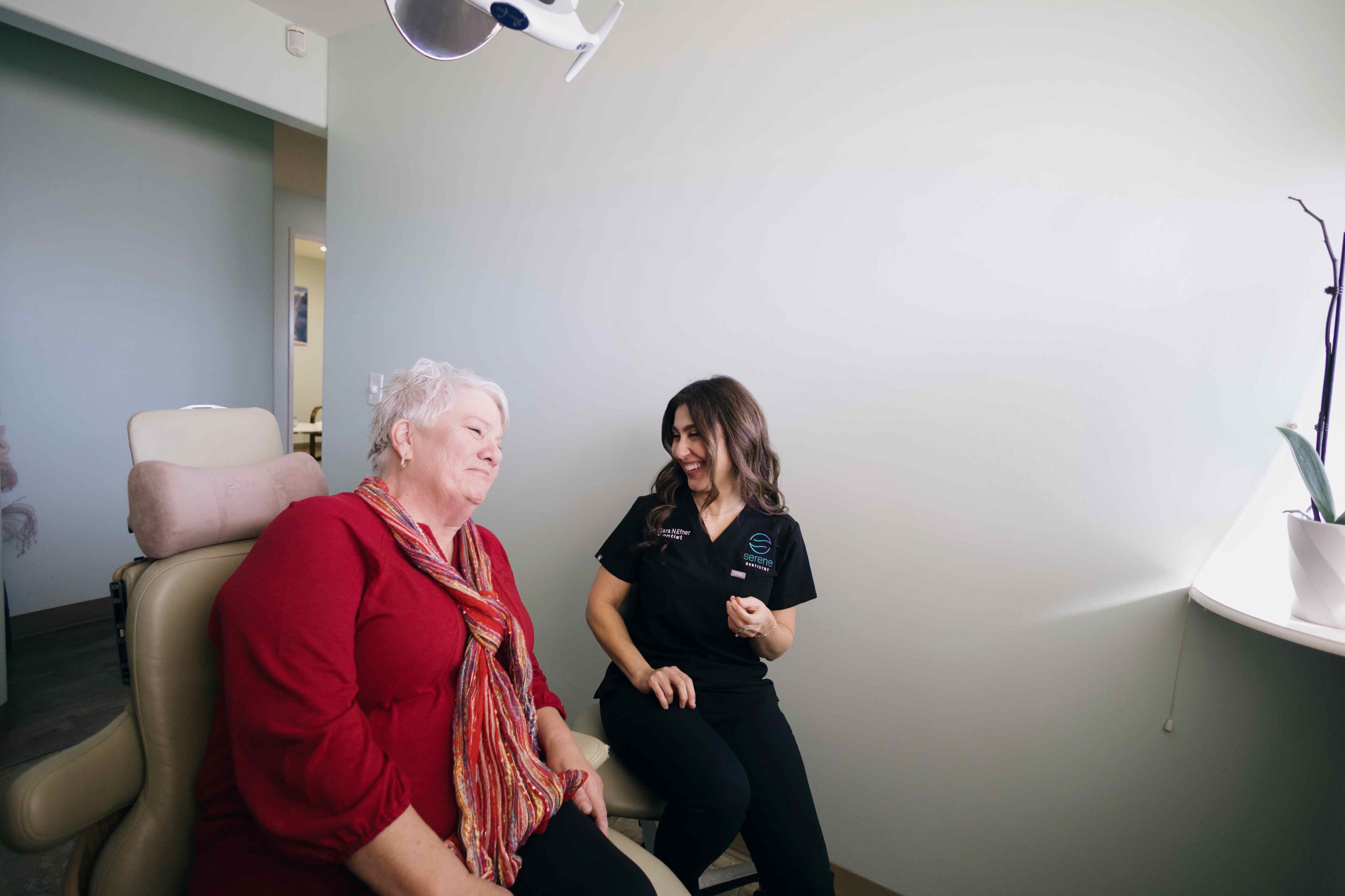 Doctor at Serene Dentistry Ventura explaining sleep apnea treatment options to a patient