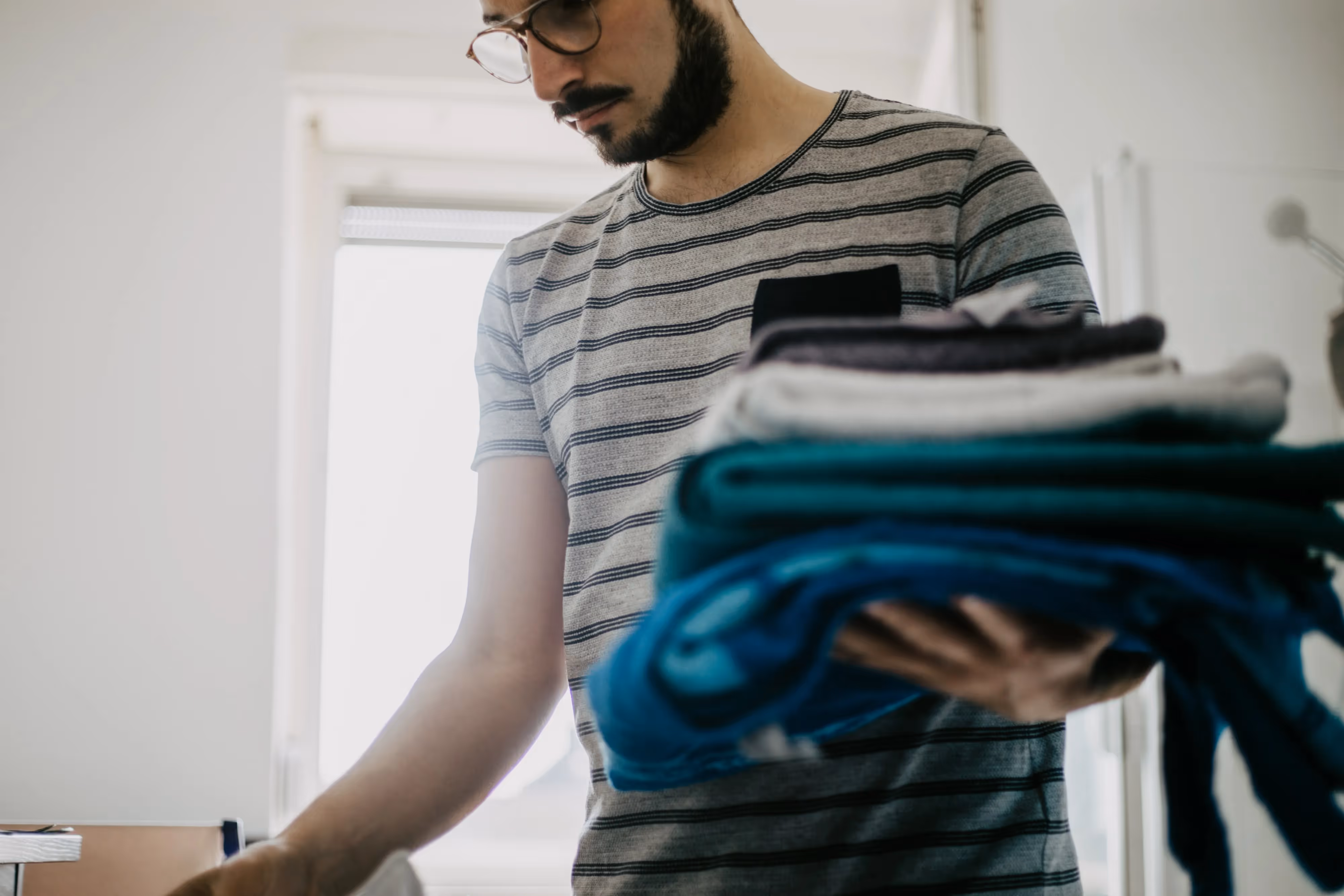 Putting Away Laundry Stock Photo
