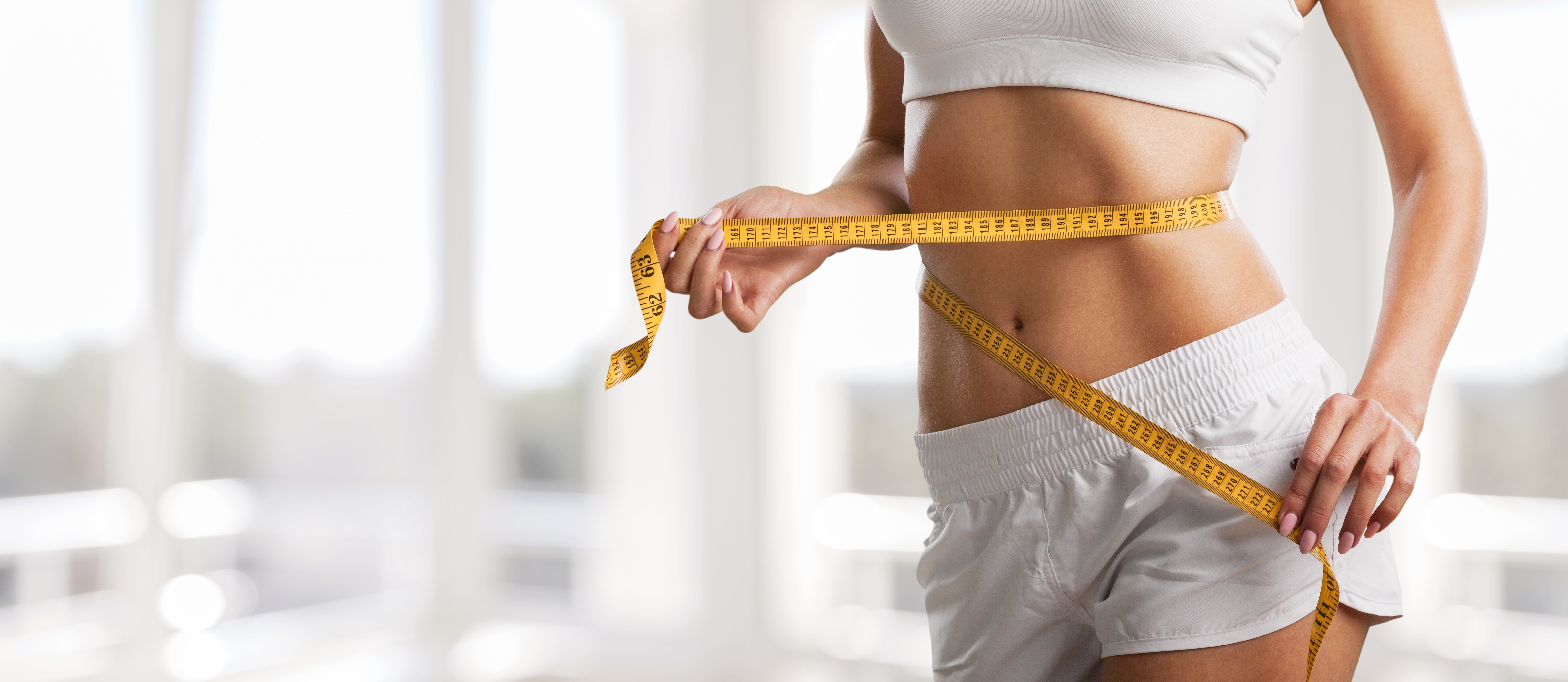 Woman feeling energized after weight loss and hormone balance