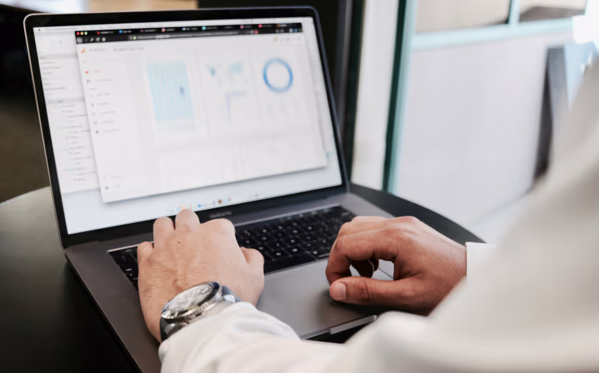 Screen of the laptop with graphs