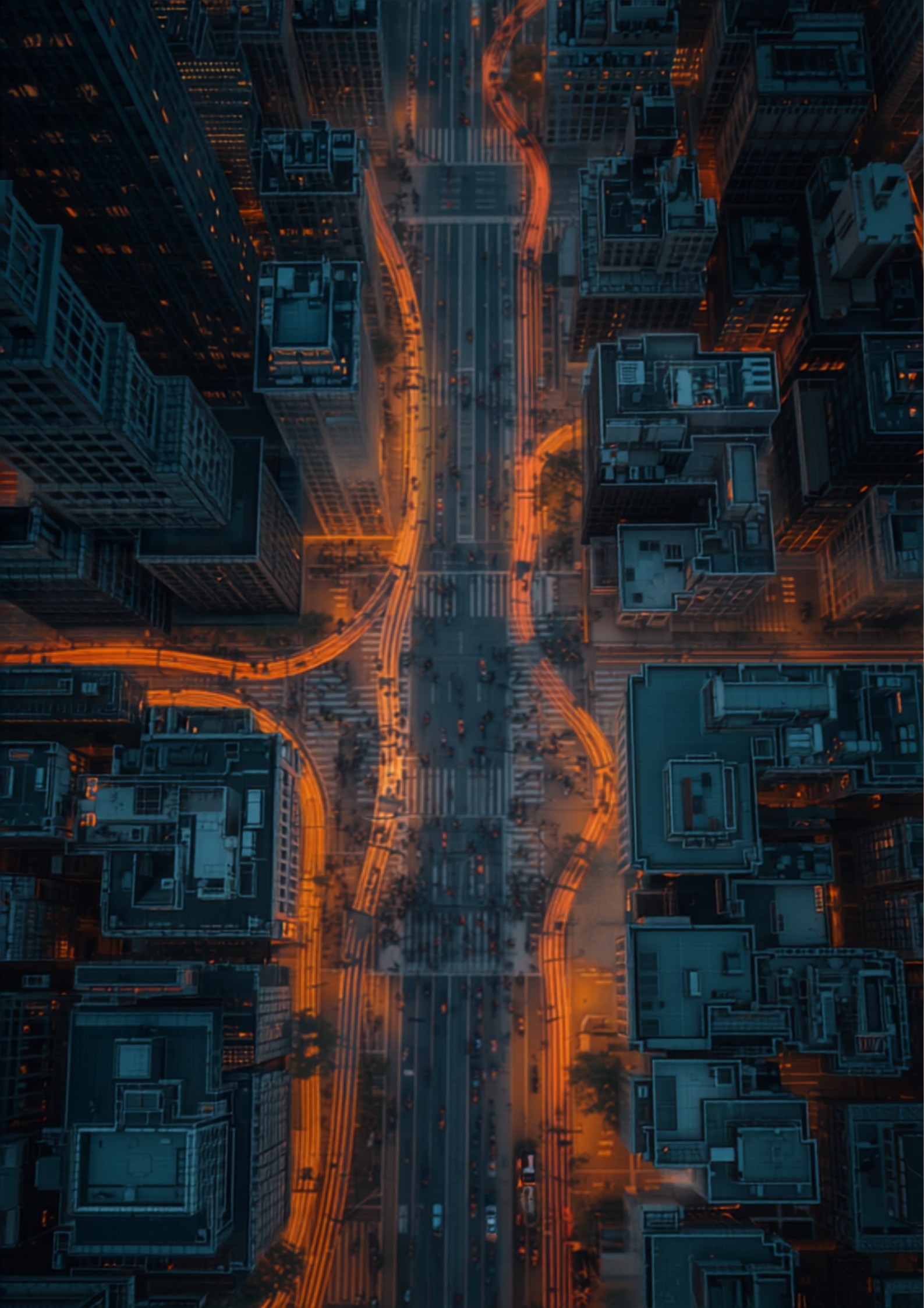 Aerial top-down view of a metropolis at dusk with flowing traffic light trails