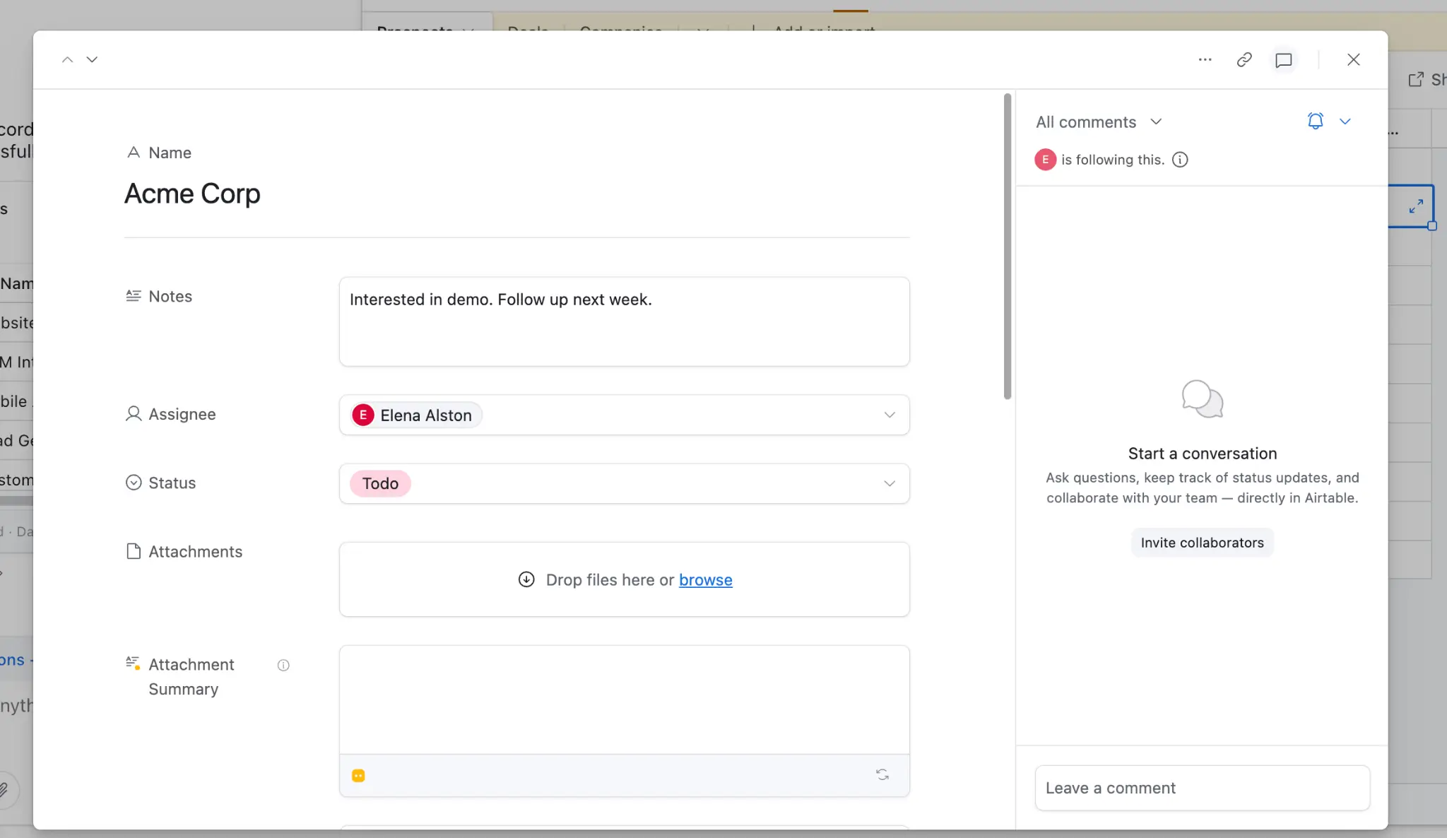 Expanded Airtable record showing notes, assignee, status and attachment fields