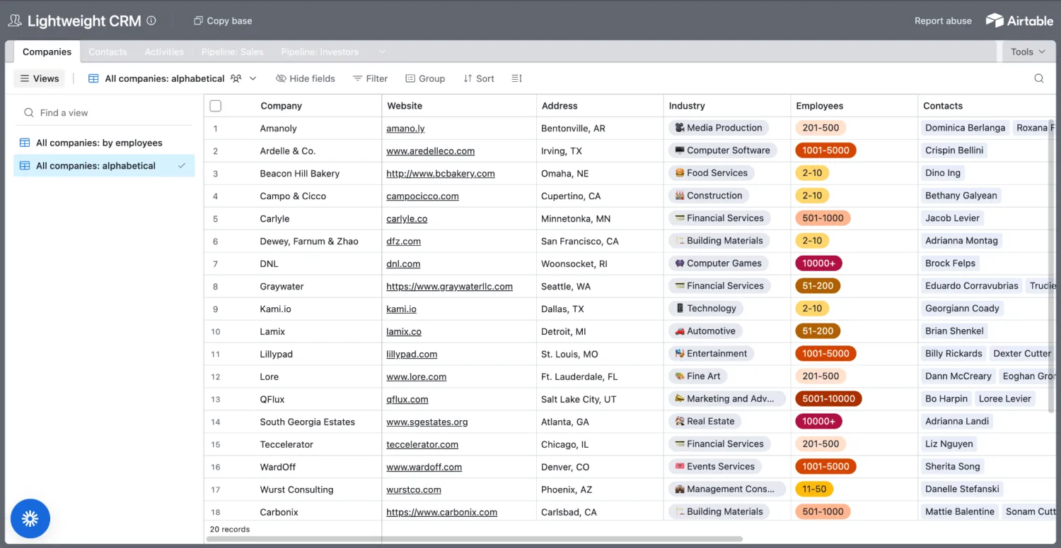Airtable Lightweight CRM base with a Companies table listing website, address, industry, employee count, and contacts