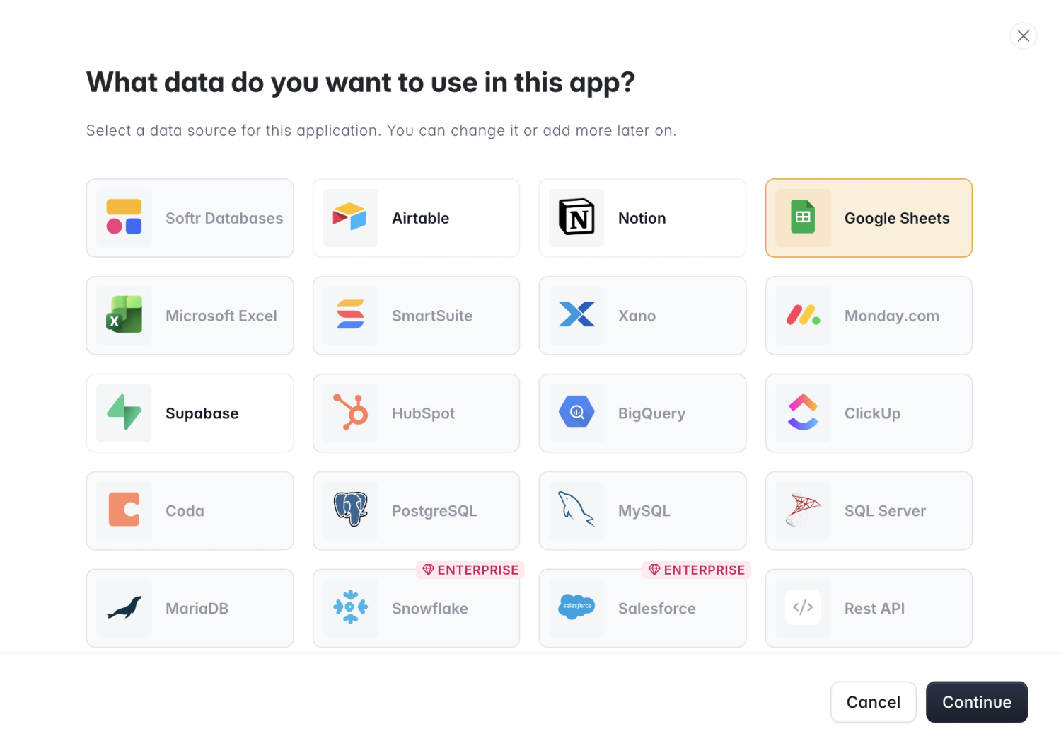 Softr data source picker with Google Sheets selected alongside Softr Databases, Airtable, and Notion