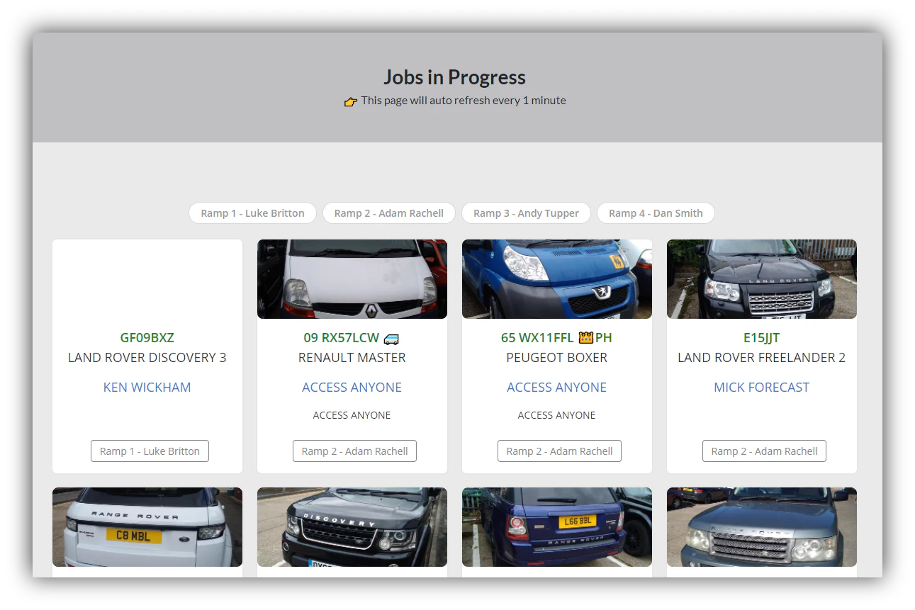 Jobs in progress board listing vehicles with registration, model, customer and assigned ramp