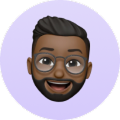 Bearded man with glasses smiling