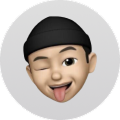 Man with black cap winking and tongue out