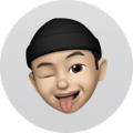 Man with black cap winking and tongue out
