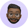 Bearded man with glasses smiling