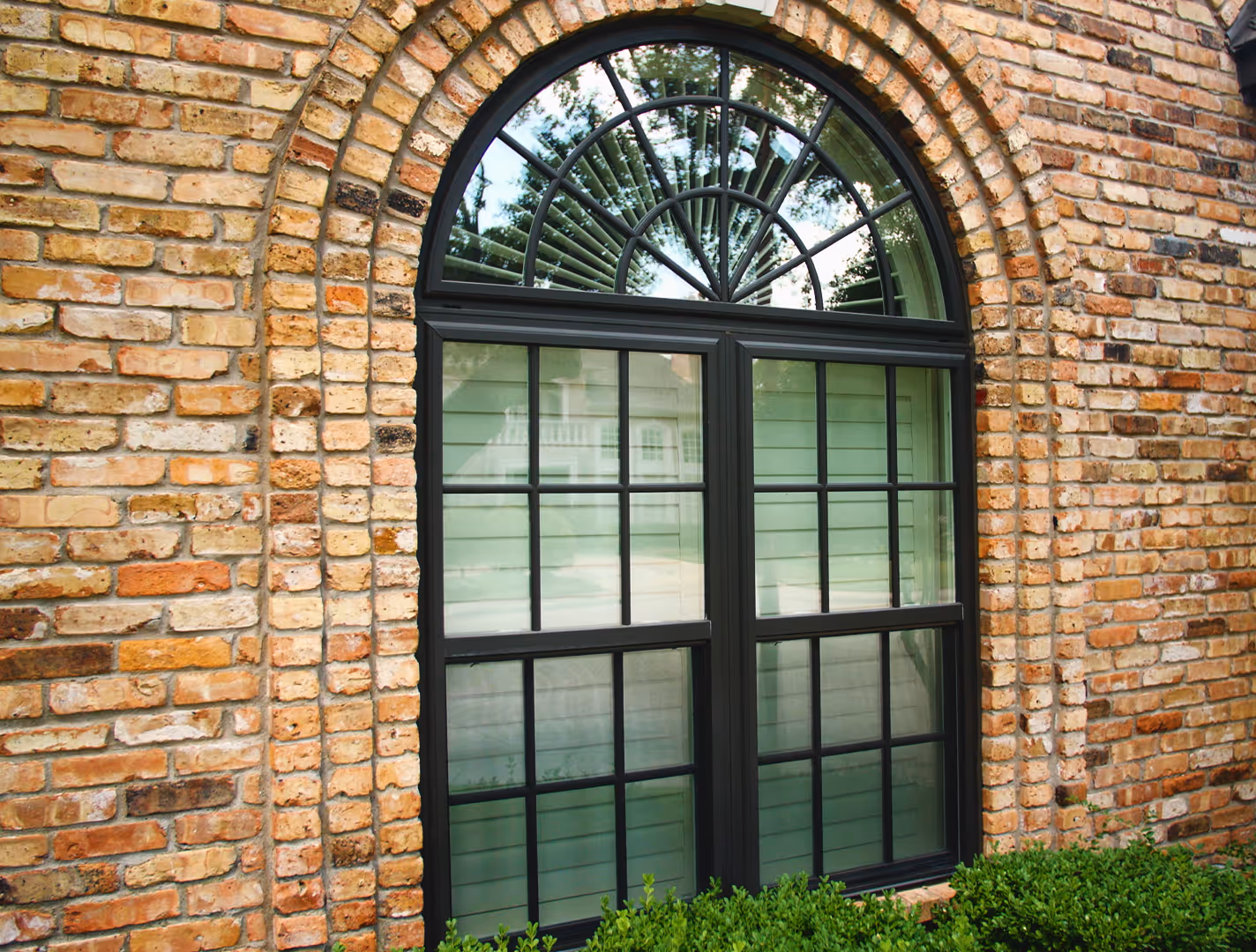 A brand new black replacement window installed at a home in Murfreesboro, TN