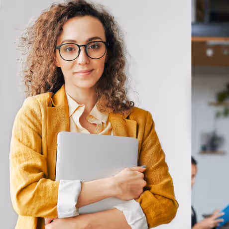 Woman holding a laptop