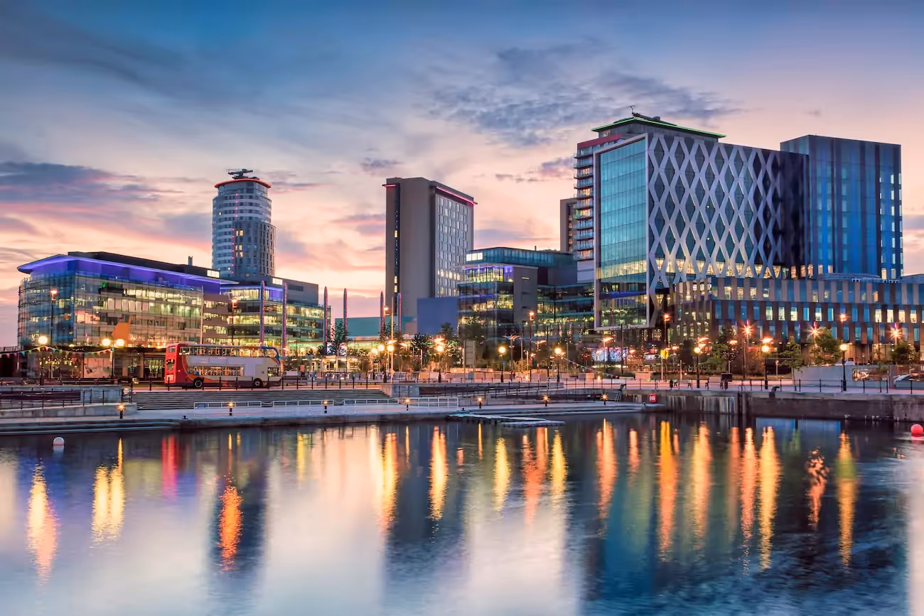 Salford Manchester skyline at sunset.