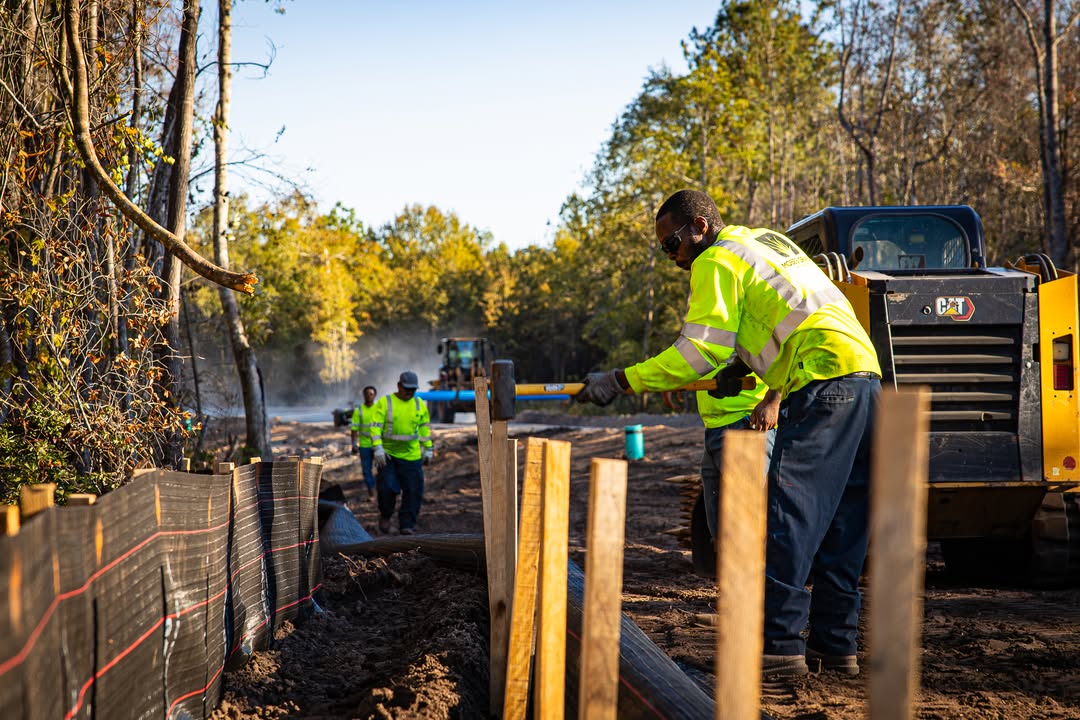 Skid steer plow trenching and seating silt fence quickly.