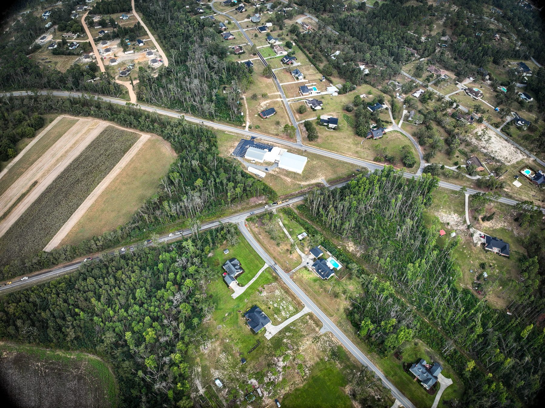 Aerial view of the Vidalia project site on Cedar Crossing Rd, showcasing the area's development and infrastructure work. Our team is focused on improving roadway safety through precise striping and signage as part of the LMIG widening in...