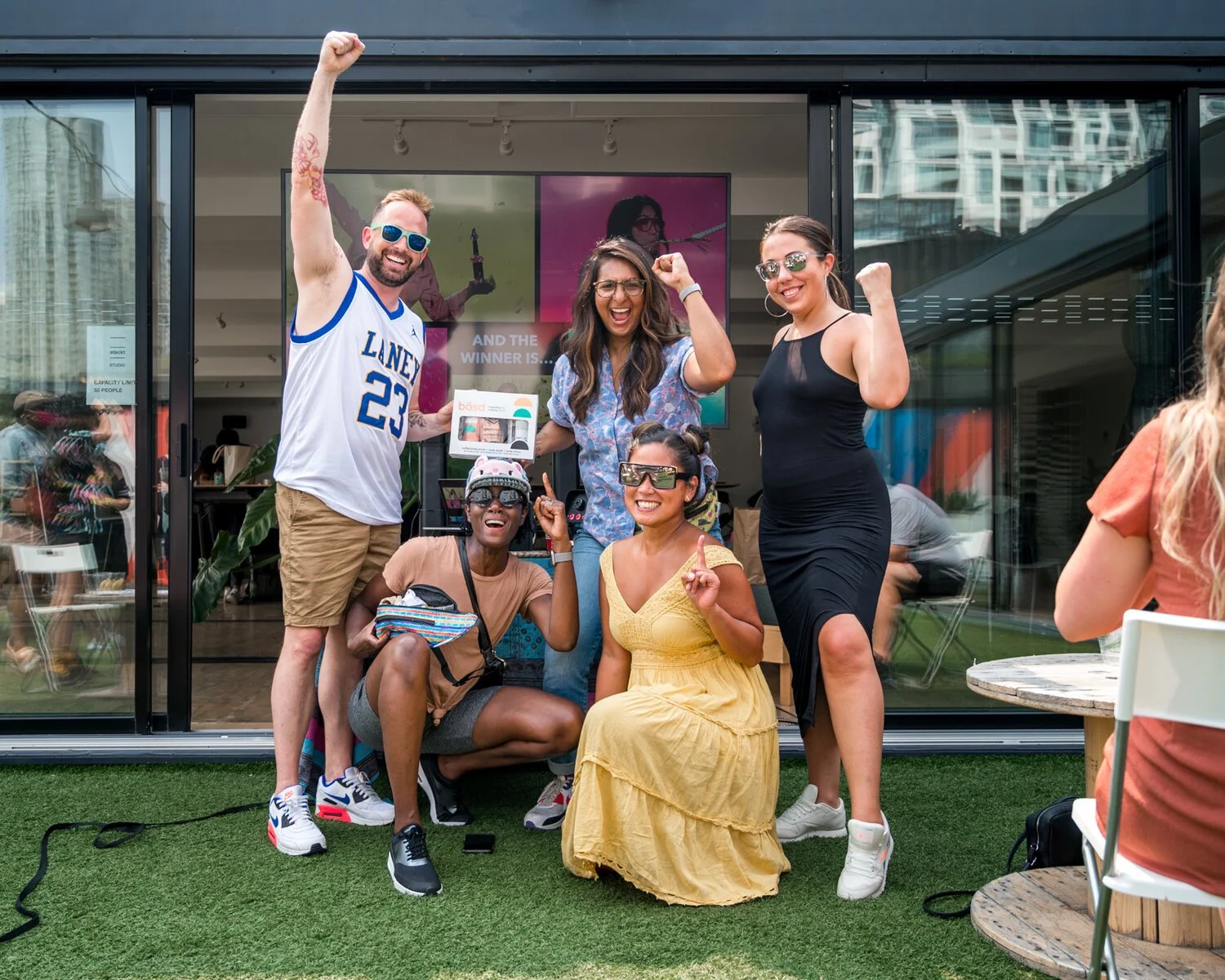  A Group of 4 people having a fun night of trivia at Stacked Market in Toronto 