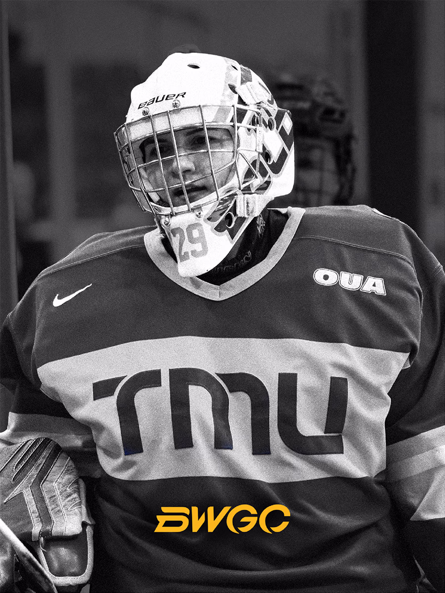 Black and white portrait shot of a female hockey goalie.