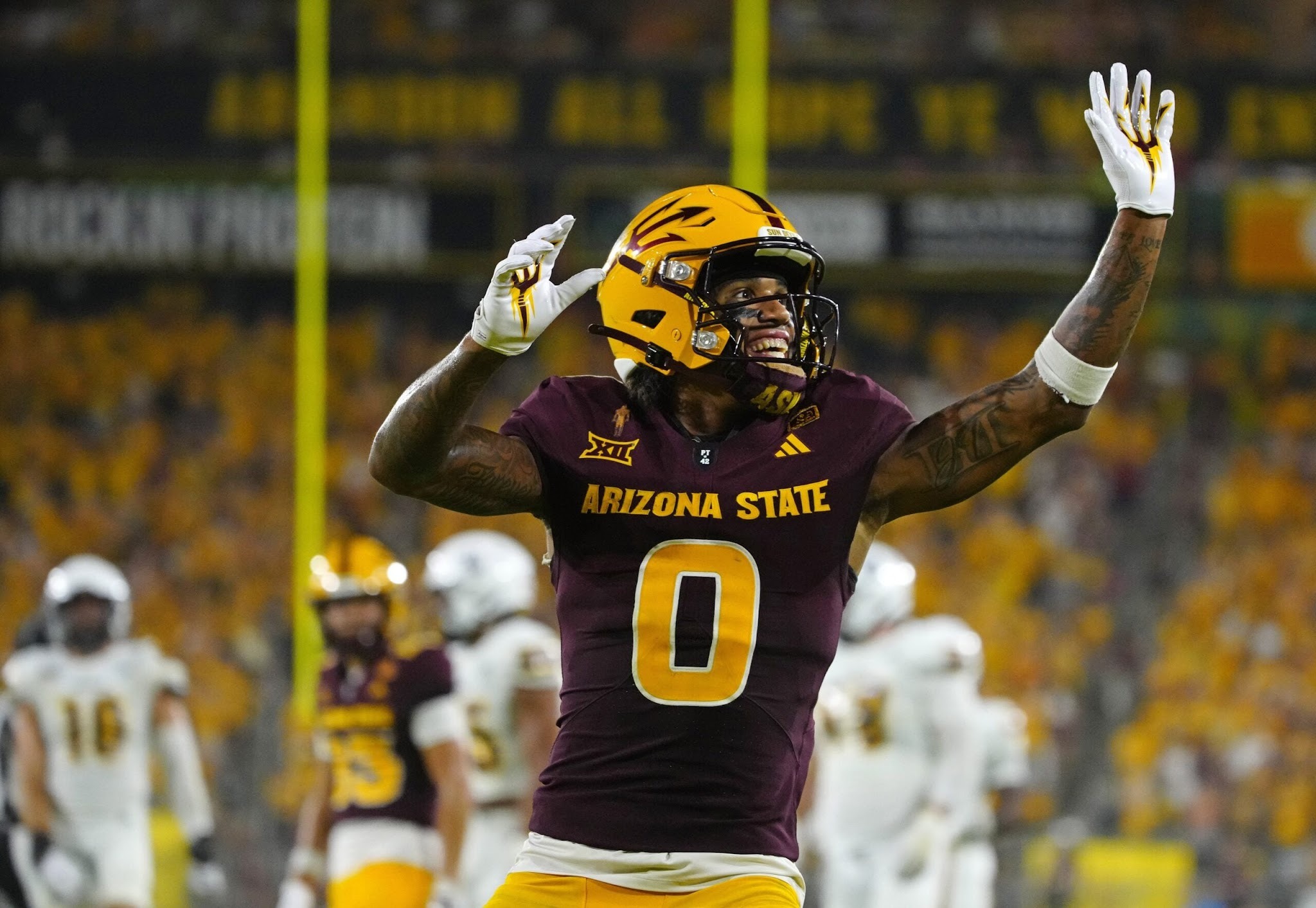 Jordyn Tyson (0) als Arizona State Sun Devil in de home jersey.