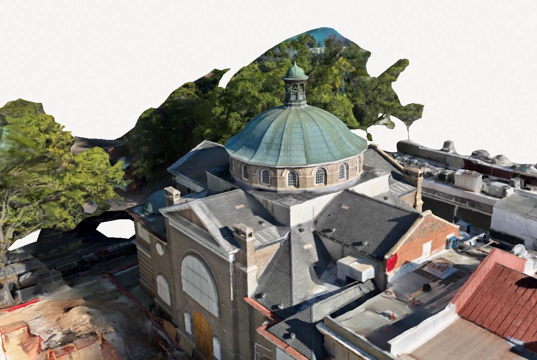Polycam 3D drone scan of a historic building with a blue-green dome surrounded by trees and rooftops.
