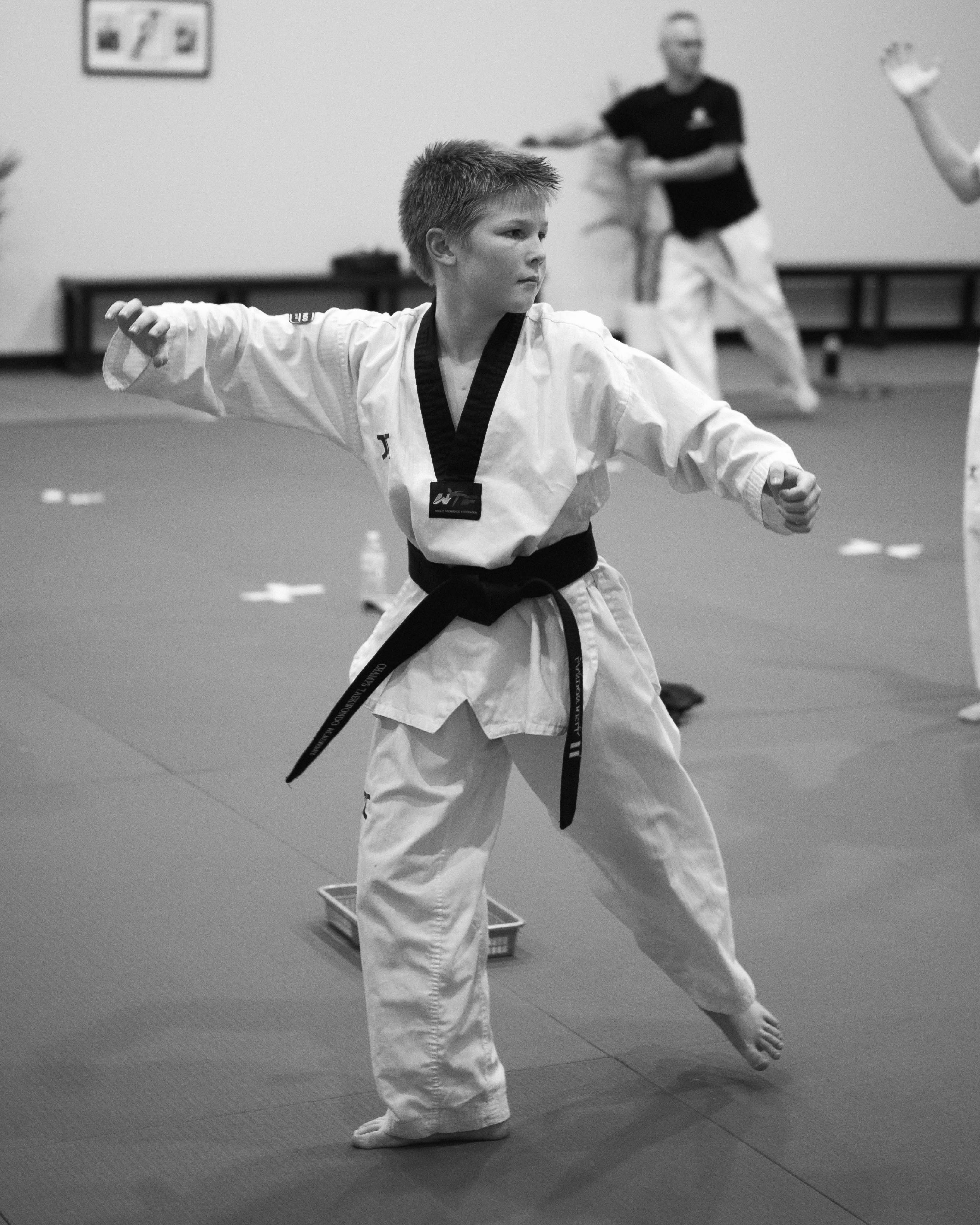 A teenager performing a Taekwondo poomsae