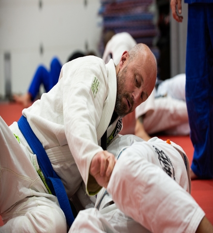 Two Adults doing brazilian jiu jitsu