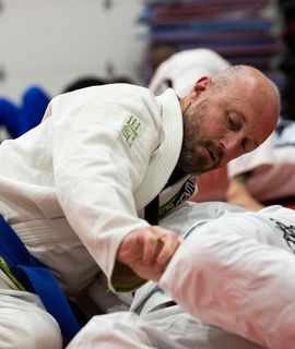 Martial Artist Practicing Brazilian Jiu-Jitsu 