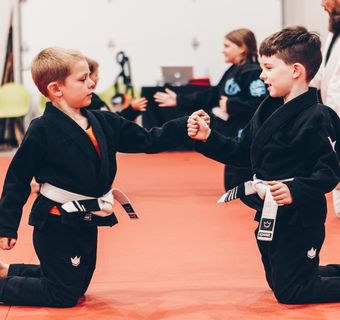 2 kids training Brazilian Jiu Jitsu