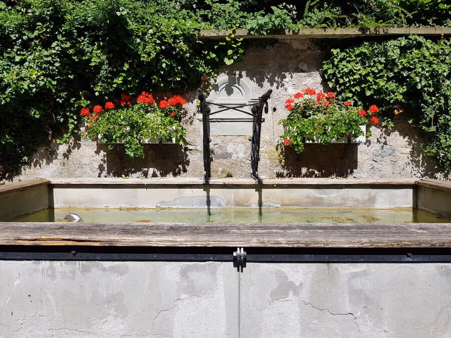 Incorporating Water Features into Your Seating Wall Design