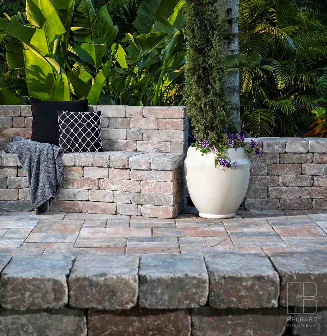 close-up of durable outdoor kitchen materials like granite countertops, stone cladding, and stainless steel appliances - outdoor kitchen installation orlando