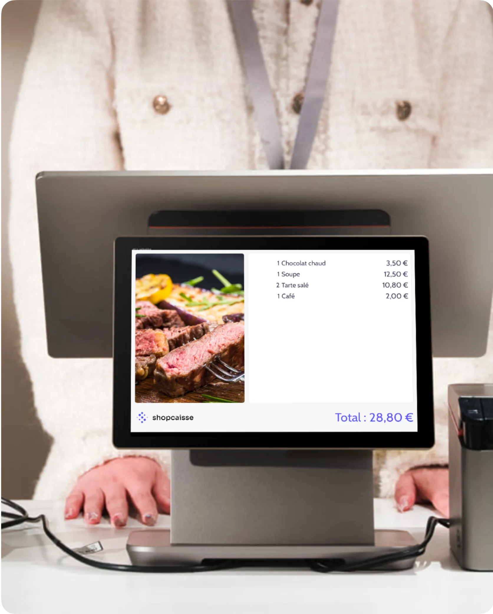 Écran de caisse affichant une commande avec image d'un steak et liste d'articles et prix total de 28,80 €.