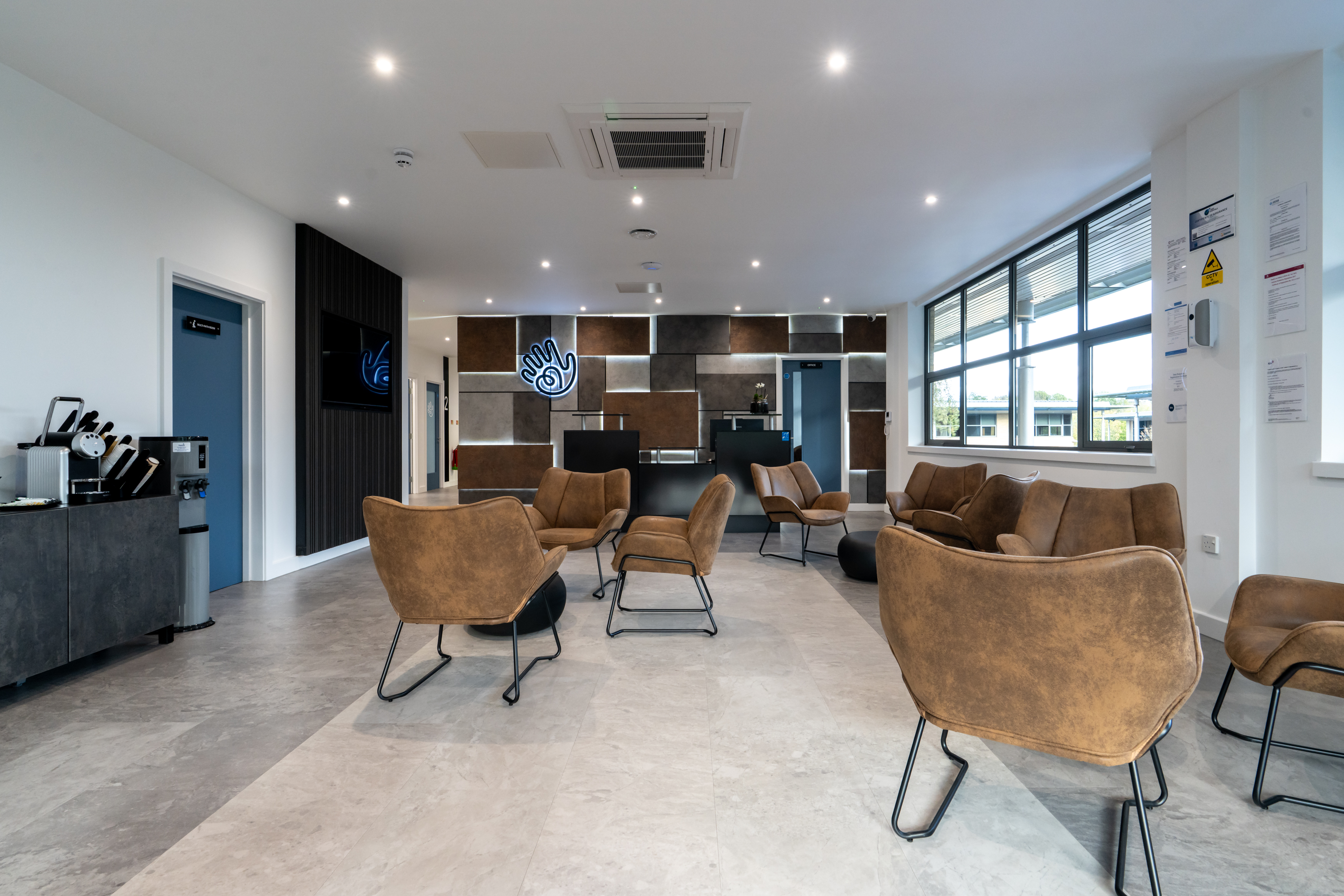 A wider angle view of the reception also showing the coffee station on the left side of the photograph.