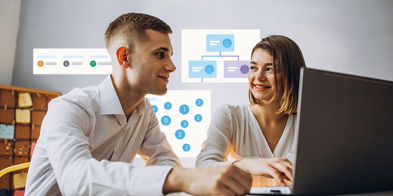 A man and a woman sat round a laptop with elements of the Red Flag Alert product UI surrounding them