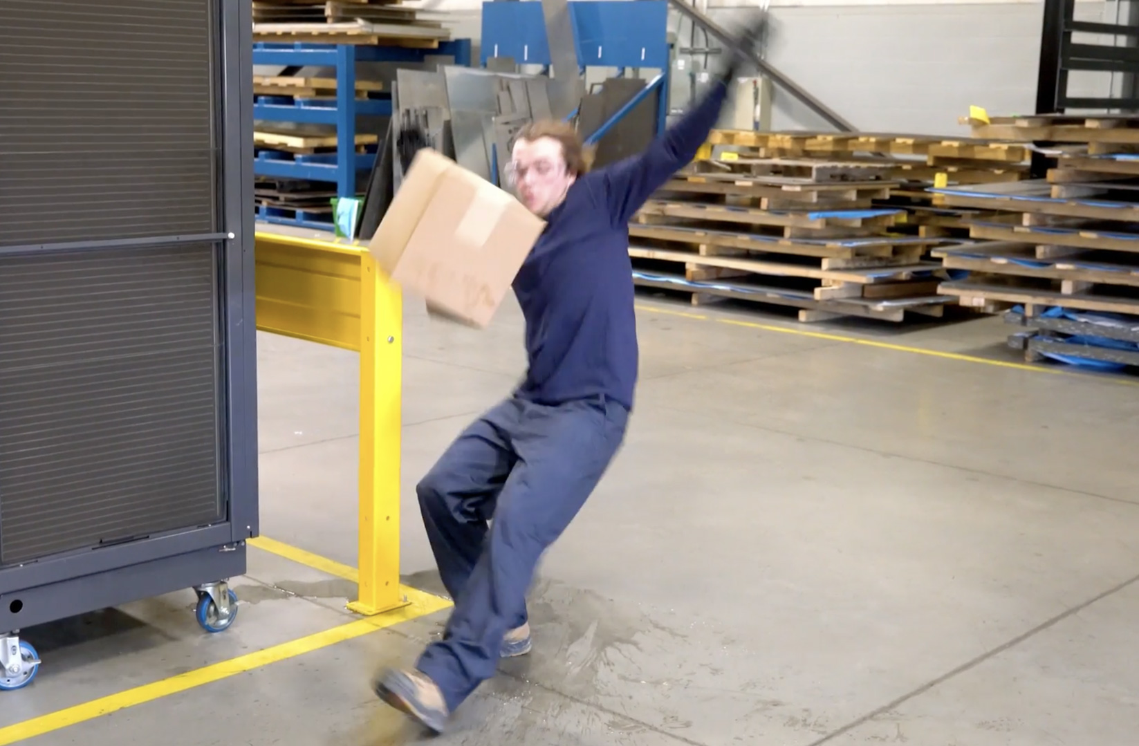 man slipping on wet floor