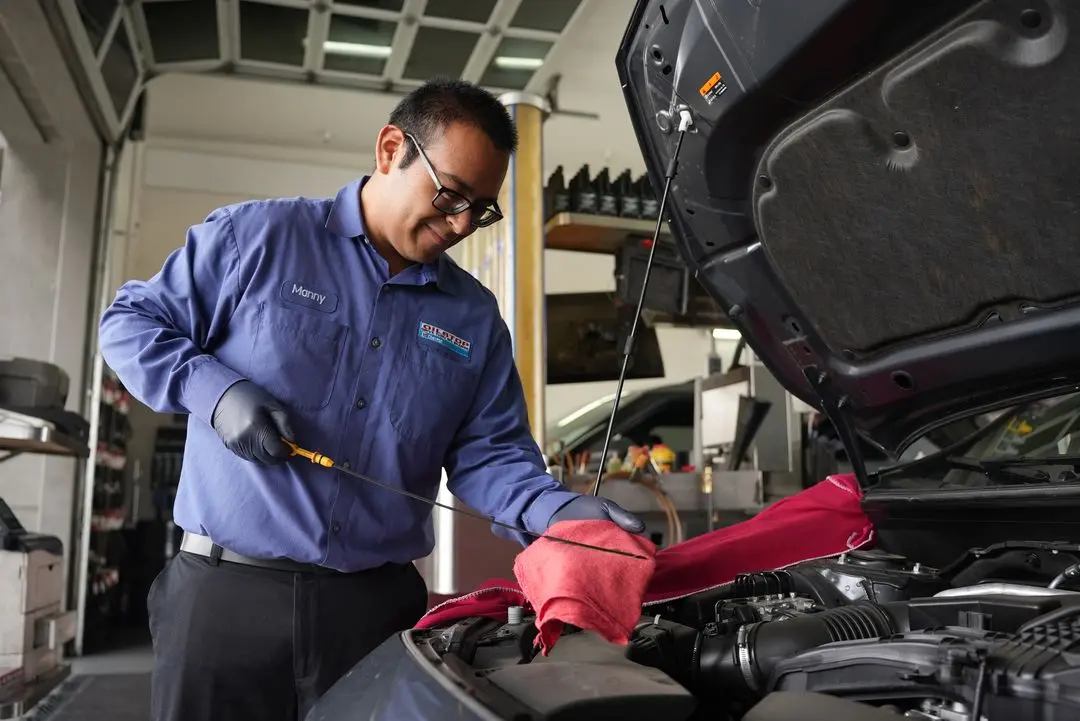 person doing a oil change
