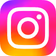 Instagram-appikon med et kameraomrids på gradientbaggrund i pink, orange og gul.