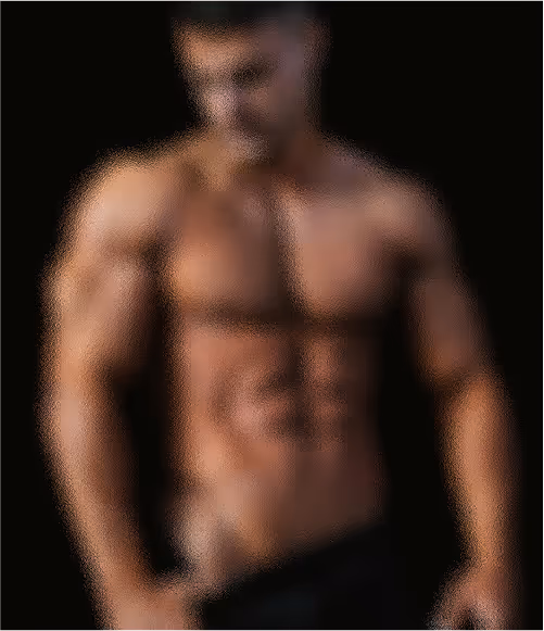 Muscular male fitness model showing defined abs - workout motivation concept