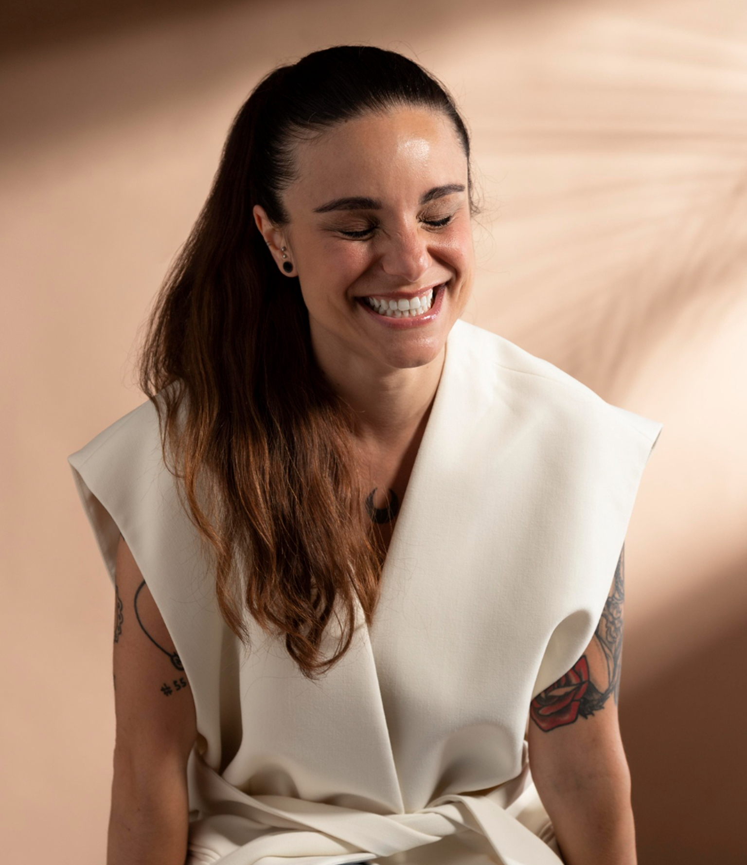Business owner smiling after switching to Adaptify’s transparent pay-as-you-go AI receptionist pricing.