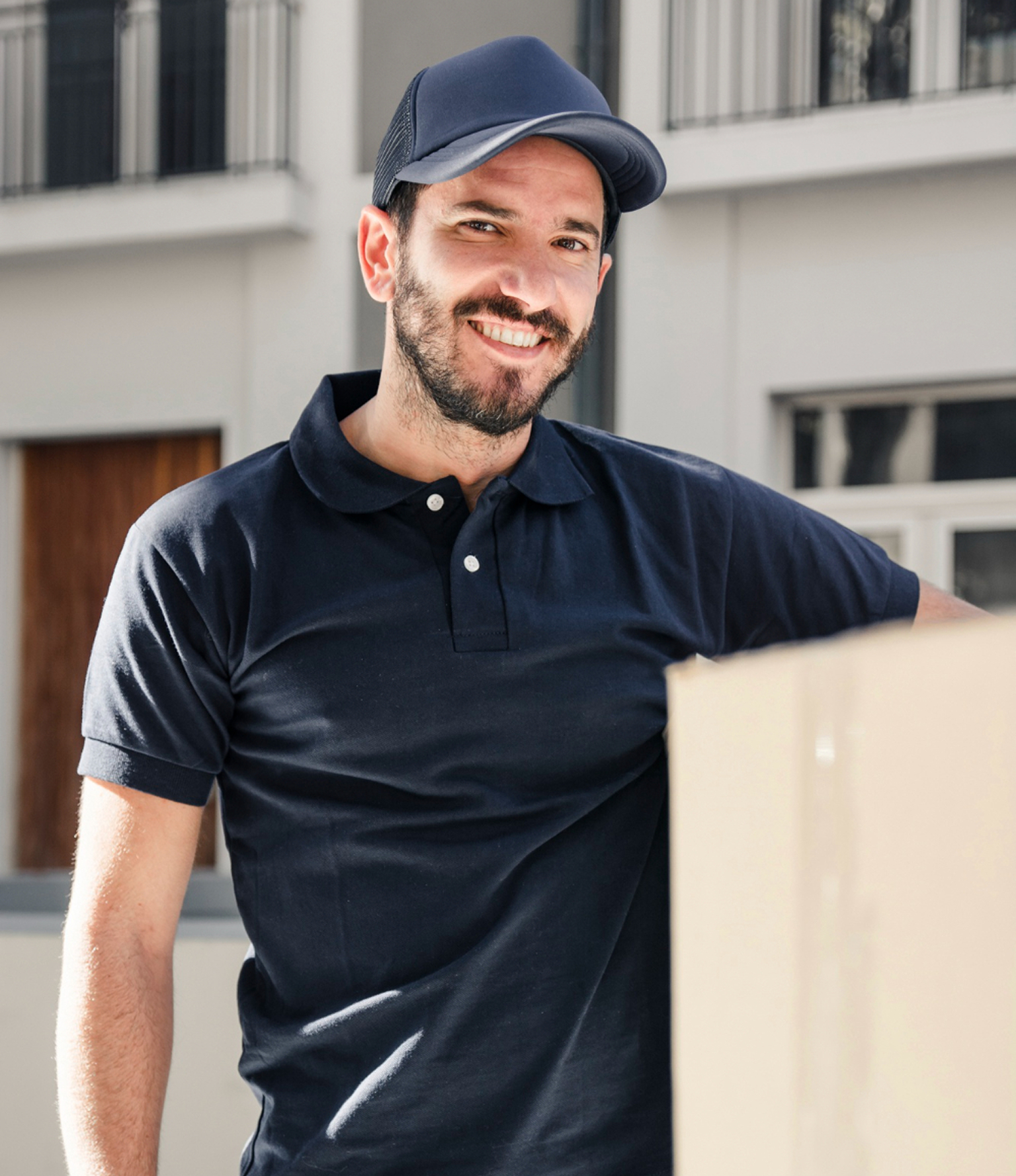 Business owner smiling after switching to Adaptify’s transparent pay-as-you-go AI receptionist pricing.