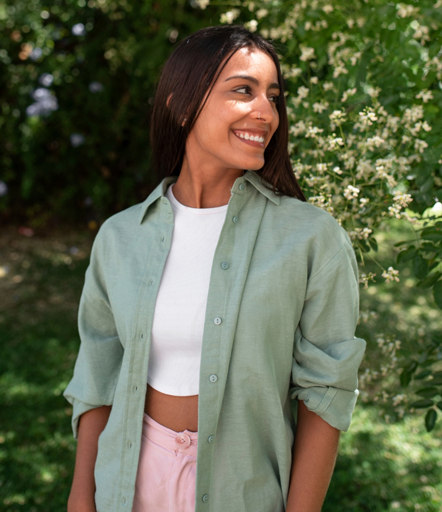 Business owner smiling after switching to Adaptify’s transparent pay-as-you-go AI receptionist pricing.