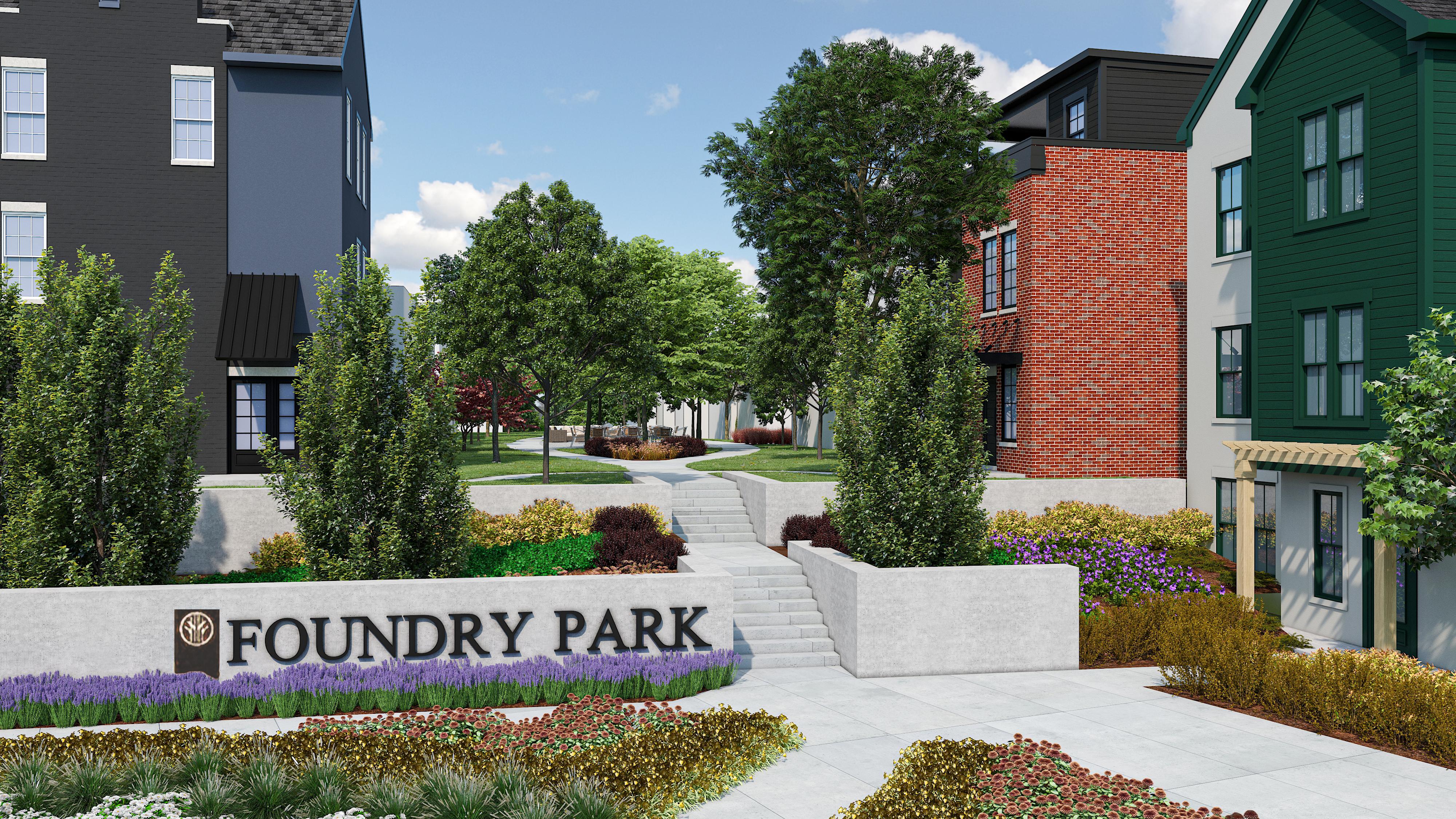 Foundry Park entrance with a landscaped walkway and new homes in Oakley, Cincinnati