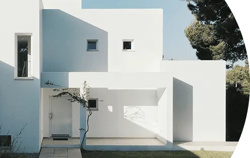 Modern white house with flat roof and clean lines