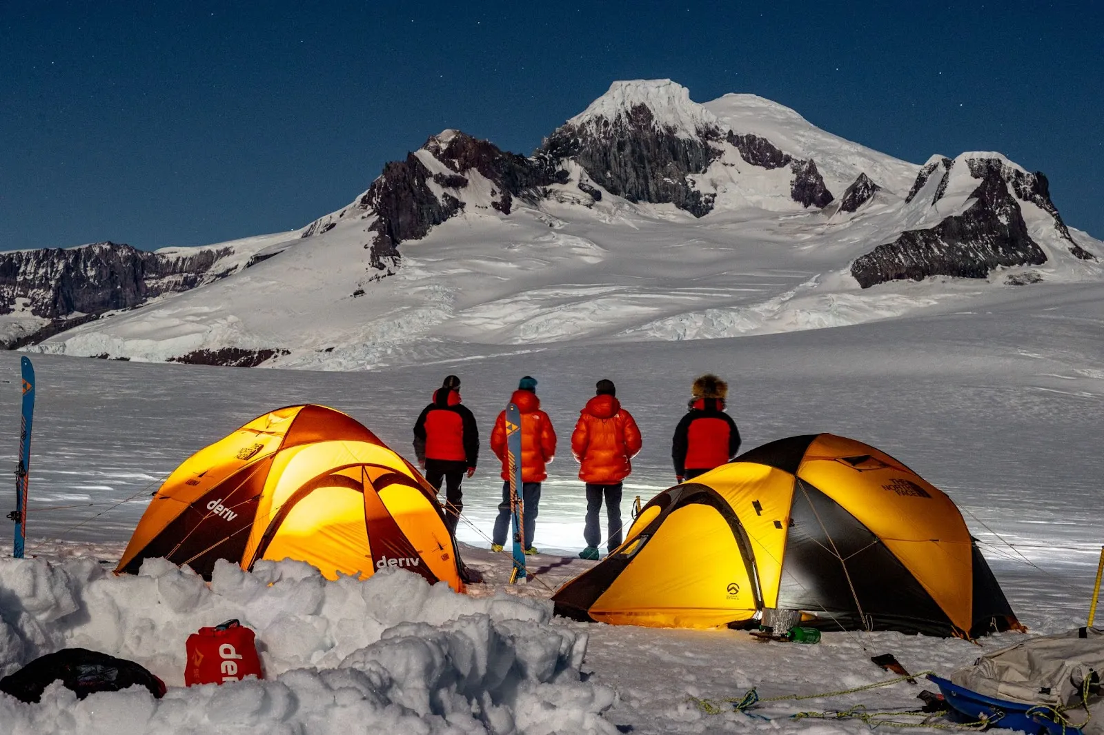 Deriv-branded tents in snowy Patagonia as part of Kahuna’s January 2024 expedition sponsored by Deriv.