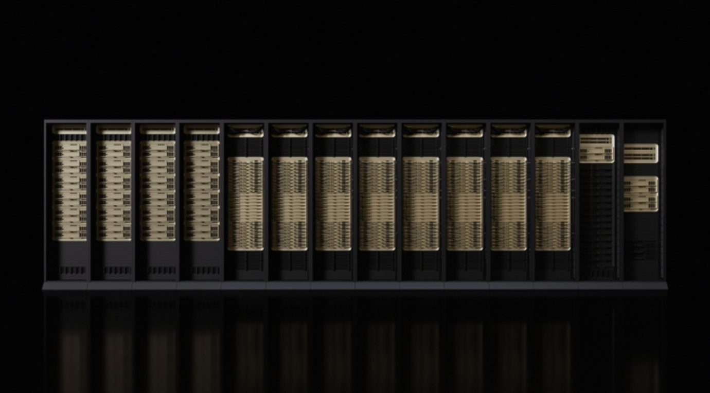 Wide, front-facing view of a row of high-performance server racks in a dark environment.